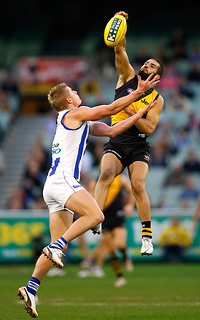 Bachar Houli of the Tigers and Liam Anthony of the Kangaroos in action during the AFL Round 17 match between the Richmond Tigers and the North Melbourne Kangaroos at the MCG, Melbourne. (Photo: Michael Willson/AFL Media) 