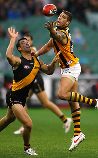 Lance Franklin of the Hawks and Alex Rance of the Tigers in action during the AFL Round 09 match between the Richmond Tigers and the Hawthorn Hawks at the MCG, Melbourne. (Photo: Sean Garnsworthy/AFL Media)